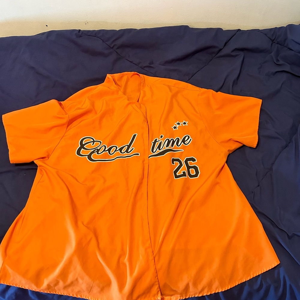 Orange and black baseball jersey